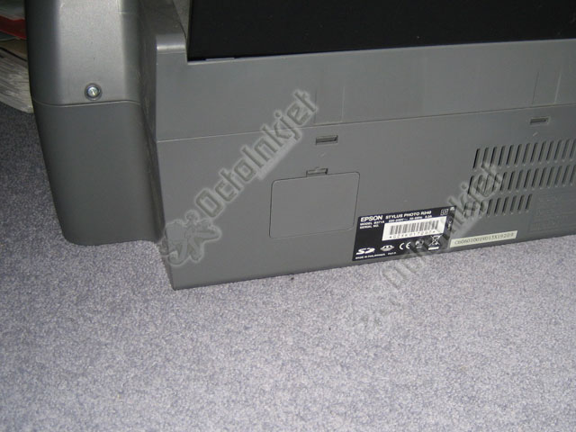 The trapdoor (access hatch) found at the back of the printer