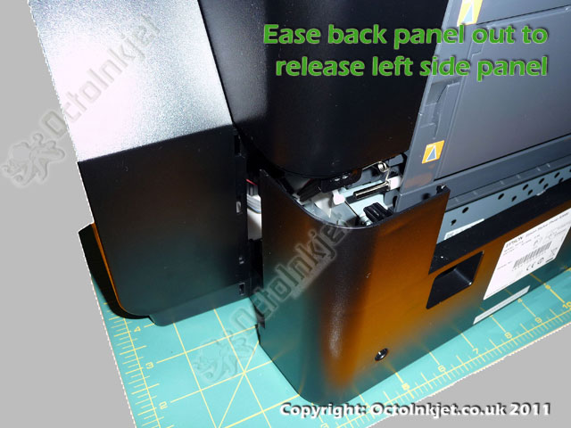 Ease the left side (when viewed from back) out to release side panel