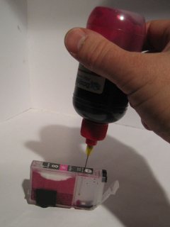 Put the needle in the cartridge hole (or CIS refill port) and refill as normal with a gentle squeeze